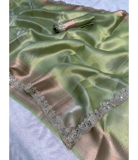 DB771  Beautiful Soft Kanjiviram Tissue Silk Zari Weaving Celebrity Inspired Sarees with Designer Handwork Lace Border.